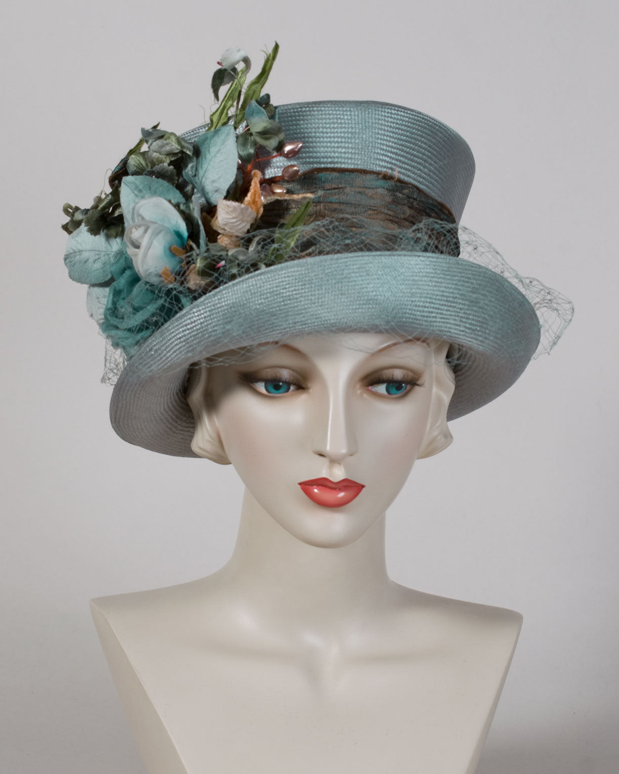 V988 Vintage: Schiaparelli, green/brown braid cloche, 22 - Louise Green  Millinery