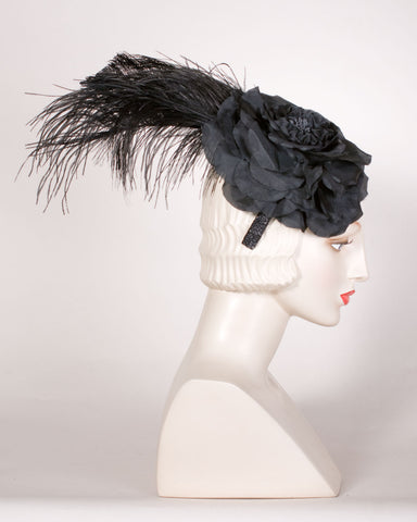 05p10 Whimsy, flower with feather, black